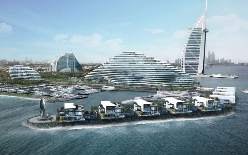 Aerial view of Jumeirah Marsa Al Arab in Dubai with private marina, yachts, and Burj Al Arab for a 2025 luxury trip.