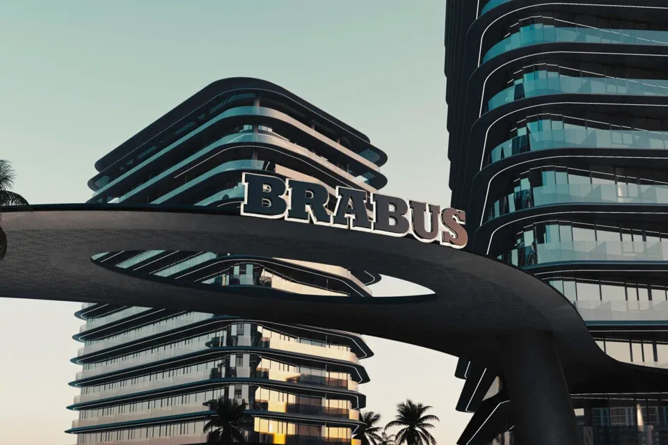 Brabus Island entrance archway with modern architecture and luxury residential towers in Abu Dhabi, UAE.
