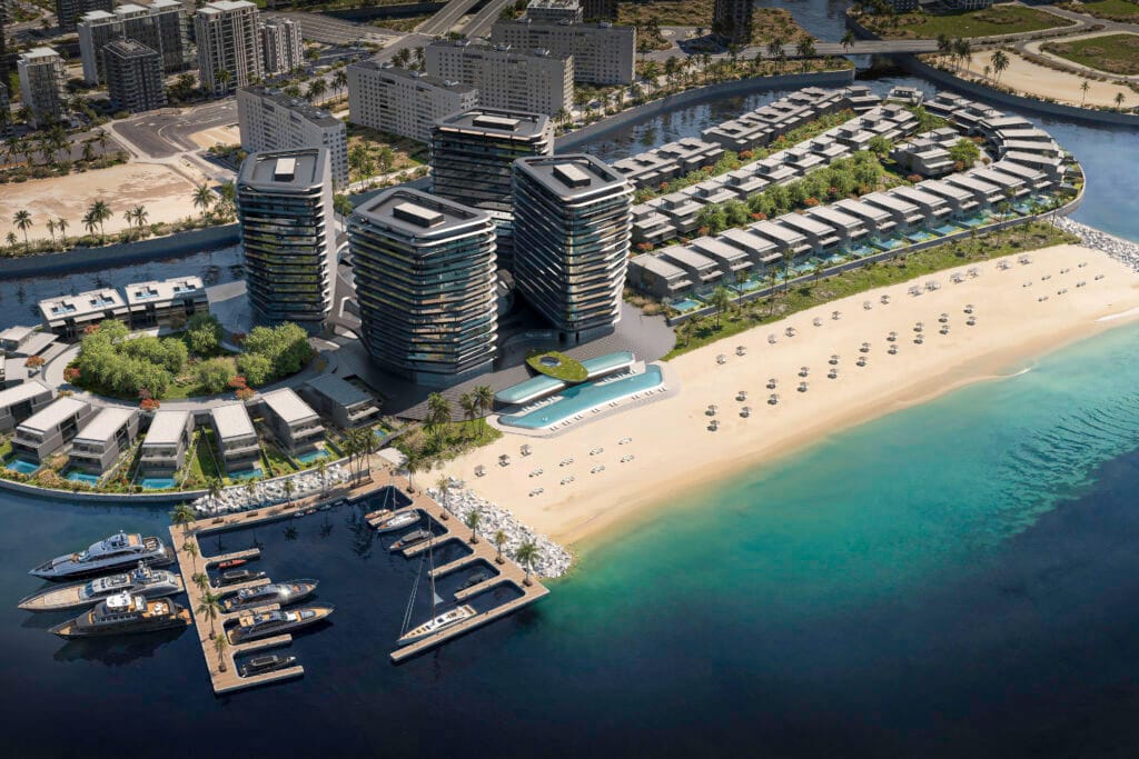 Aerial view of Brabus Island in Abu Dhabi featuring beachfront villas, luxury towers, and private pools near the shoreline.