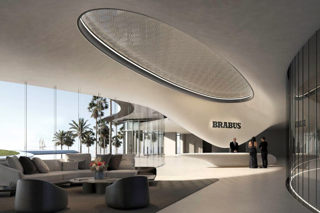Luxury Brabus island lobby with modern curved architecture, glass walls, and ocean view in Umm Al Quwain, UAE.