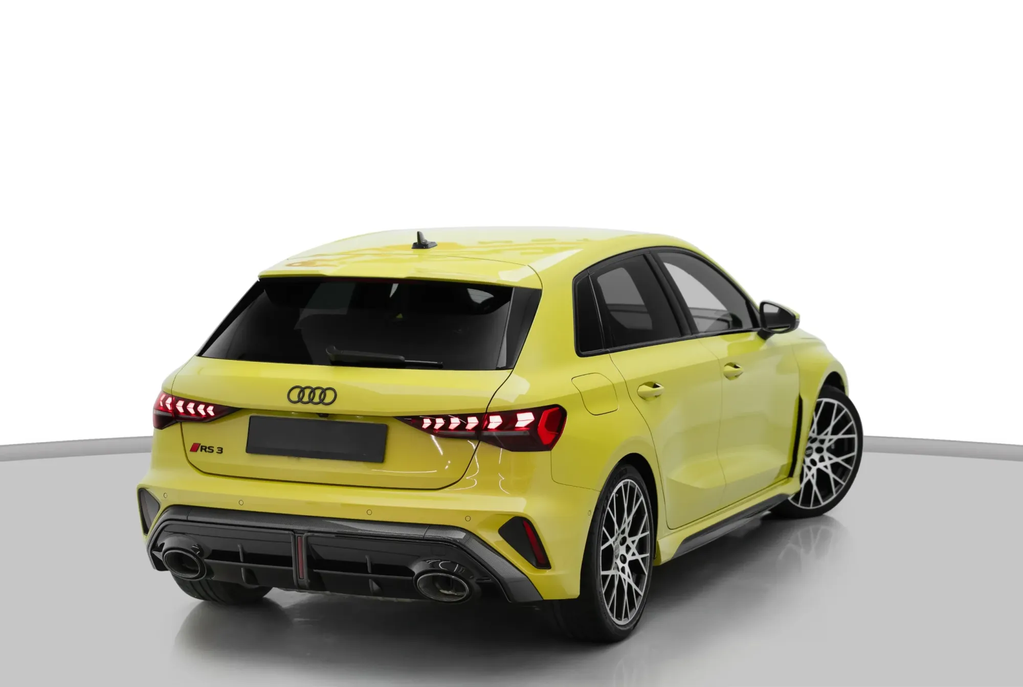 2024 Yellow Audi RS3 Sportback Rear View – Sporty Luxury Car with Dual Exhaust, Available for Rent in Dubai