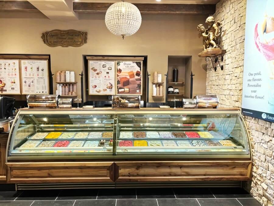 Amorino Dubai gelato parlour interior with colourful Italian ice cream display and rustic decor