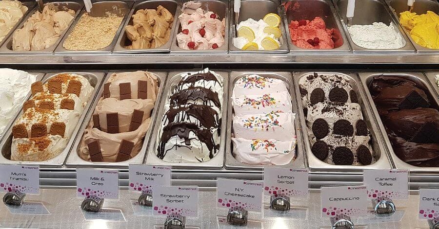 Conestreet Dubai homemade gelato display with assorted flavours like cheesecake, sorbet, and cappuccino