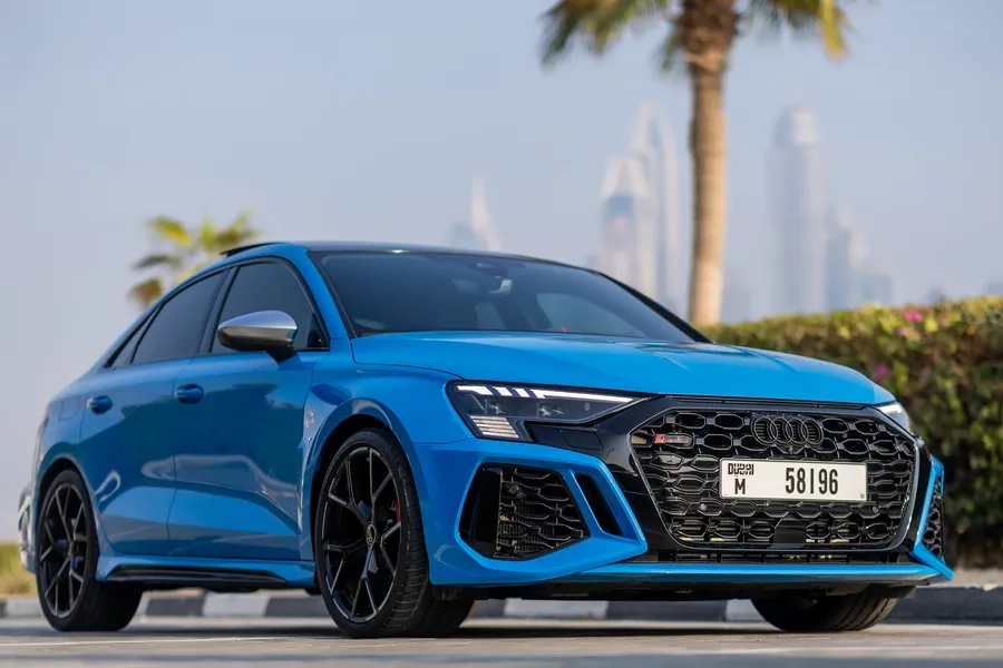 Yellow Audi RS3 Sportback at Solid Cars, premium hatchback rental in Dubai with no deposit and instant delivery