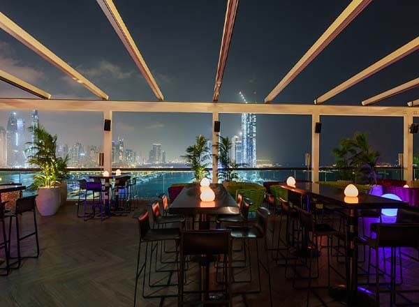 Barfly by Buddha-Bar rooftop lounge in Dubai with skyline views, ambient lighting, and modern night atmosphere