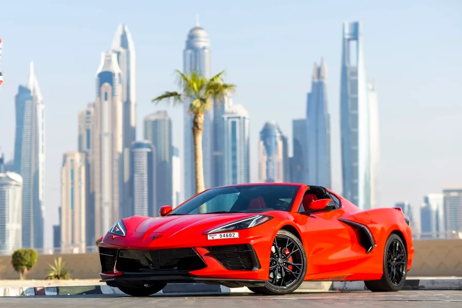 Red Chevrolet Corvette C8 at Solid Cars, high-performance sports car rental in Dubai with 24/7 delivery and no deposit