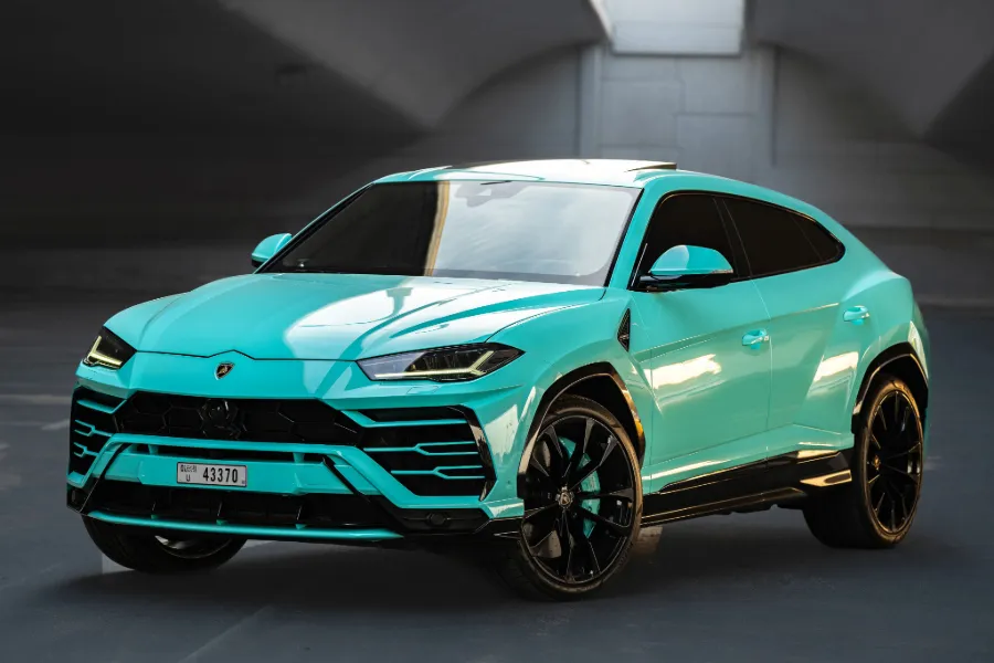 Tiffany Blue Lamborghini Urus at Solid Cars, luxury SUV rental in Dubai with free delivery, no deposit, and 24/7 booking