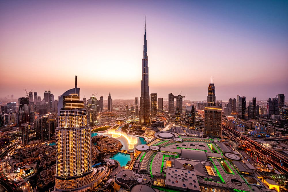 Burj Khalifa and Downtown Dubai skyline at sunset – perfect layover destination near Dubai Airport 2025