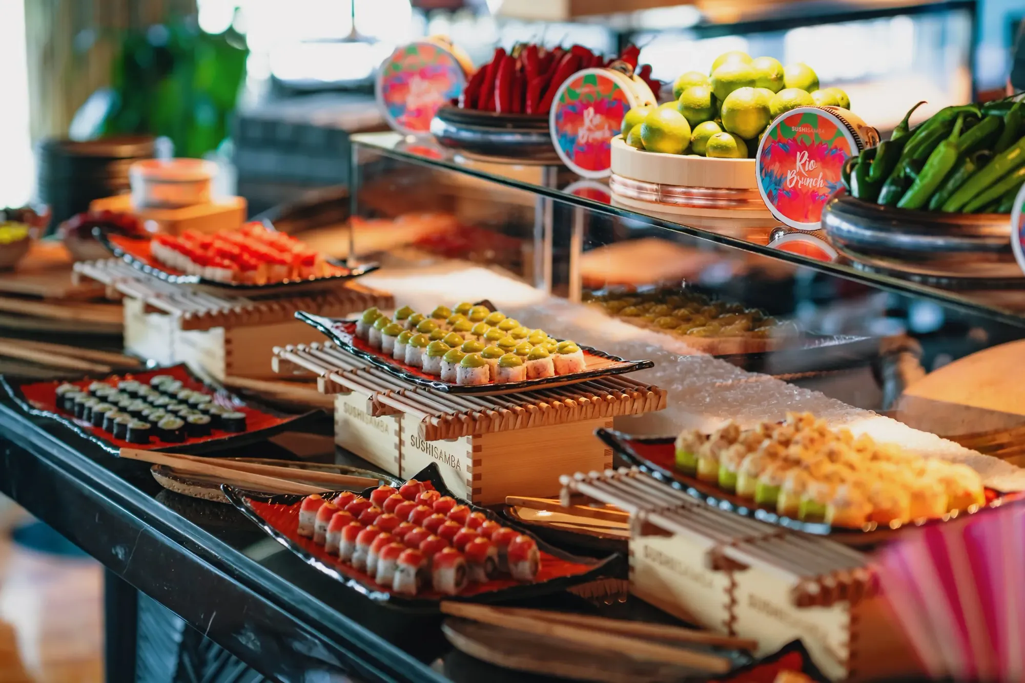 Colorful Friday brunch buffet in a Dubai luxury hotel with sushi, fresh fruits, and international dishes