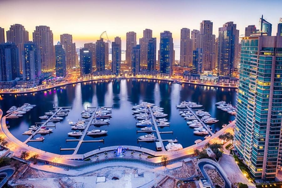Dubai Marina luxury towers and yachts highlighting premium lifestyle and higher cost of living in 2025