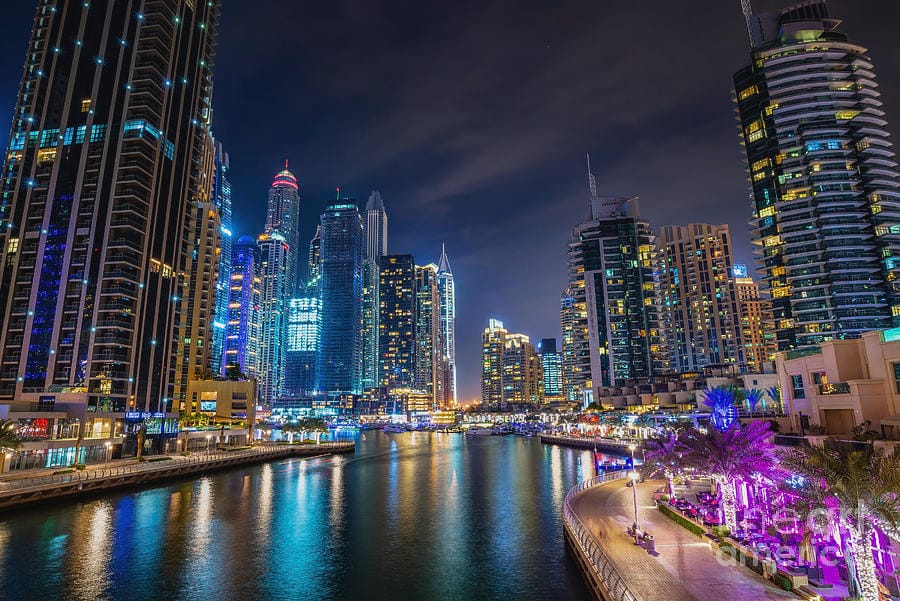 Dubai Marina Walk at night with illuminated skyscrapers, waterfront promenade, and vibrant nightlife in 2025