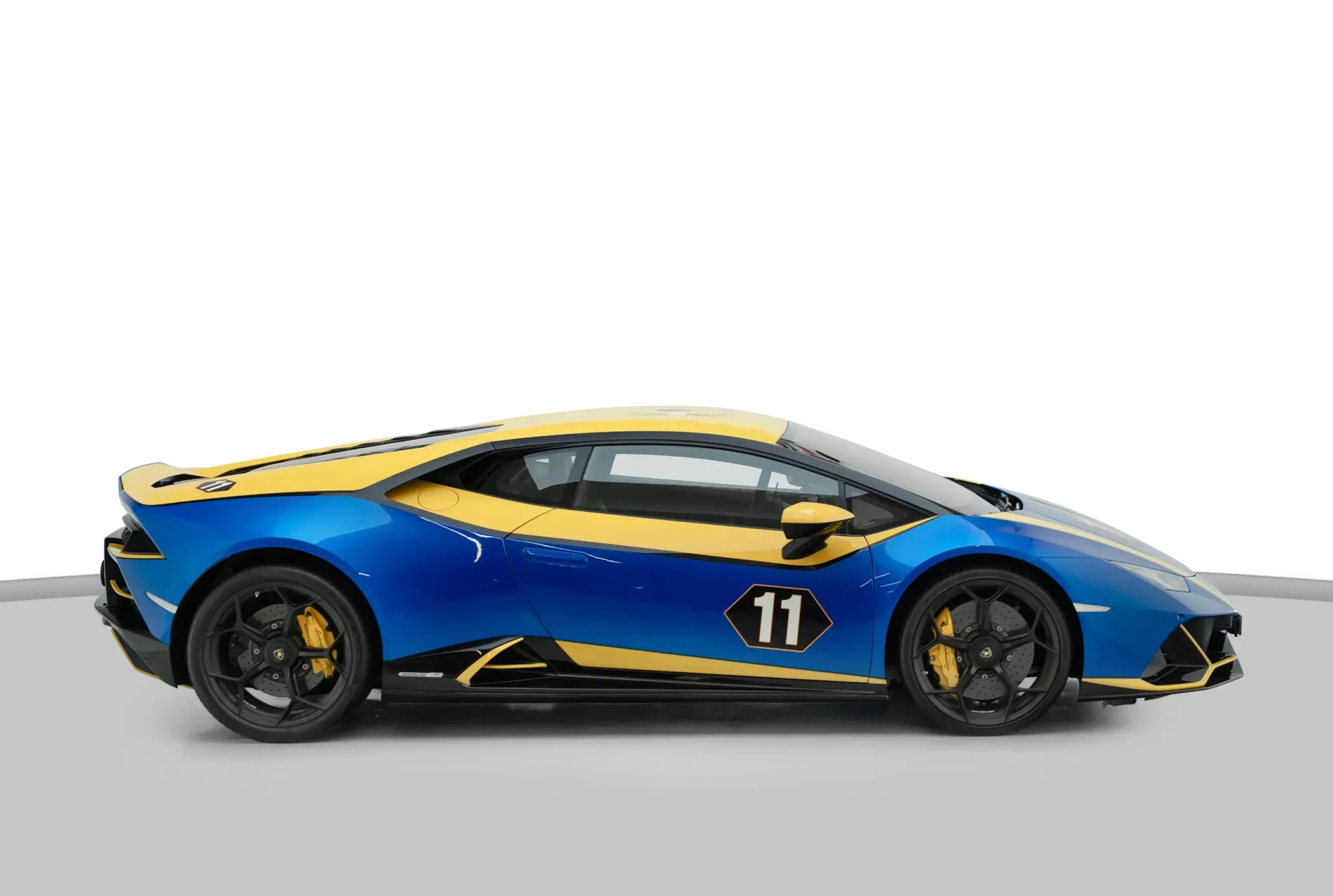 Lamborghini Huracan Evo GT Celebration in blue and yellow (1 of 36) – available for rent in Dubai from Solid Cars
