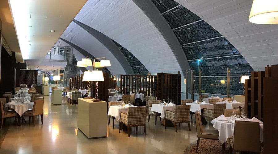 Elegant Dubai Airport lounge dining area – relax and dine during a DXB layover in 2025