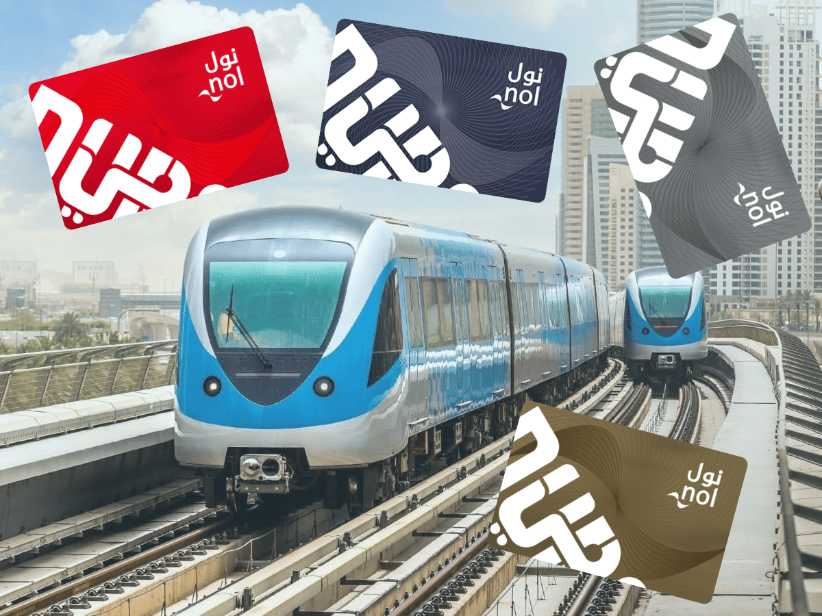Dubai Metro trains with different Nol Card types: Red, Silver, Gold, and Blue used for public transport payments in Dubai.