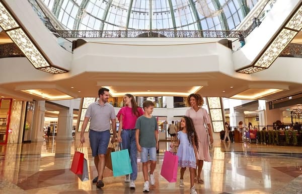Family enjoying summer shopping at Mall of the Emirates during Dubai Summer Surprises 2025