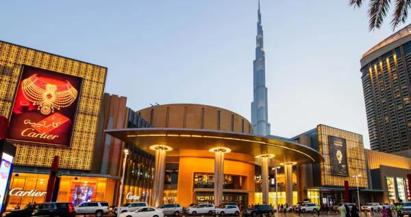 Dubai Mall exterior at evening with crowds showcasing late shopping and dining culture